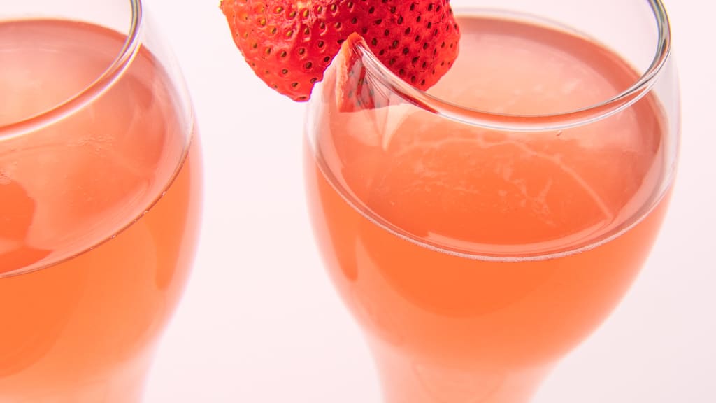 Close-up of a mimosa with a strawberry