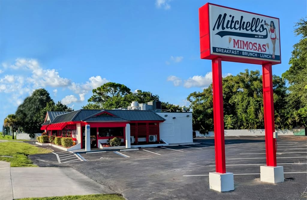 Mitchell's Restaurant on US-1 in Cocoa, Florida, with its sign: Mitchell's, est. 2014, MIMOSAS, BREAKFAST, BRUNCH, LUNCH